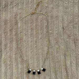 Elegant Gold and Black Necklace